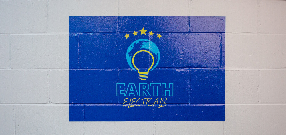 Wall graphics with a blue background and fully branded with a logo
