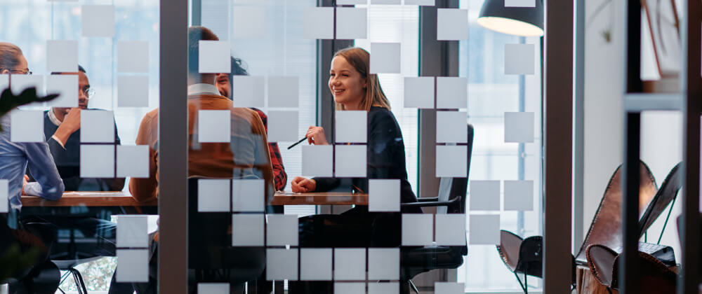An office meeting room with window graphics for privacy